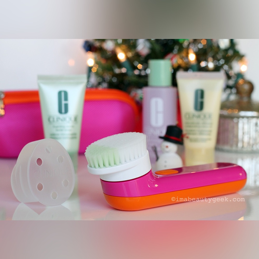 Clinique Pink and Orange Sonic Facial Brush